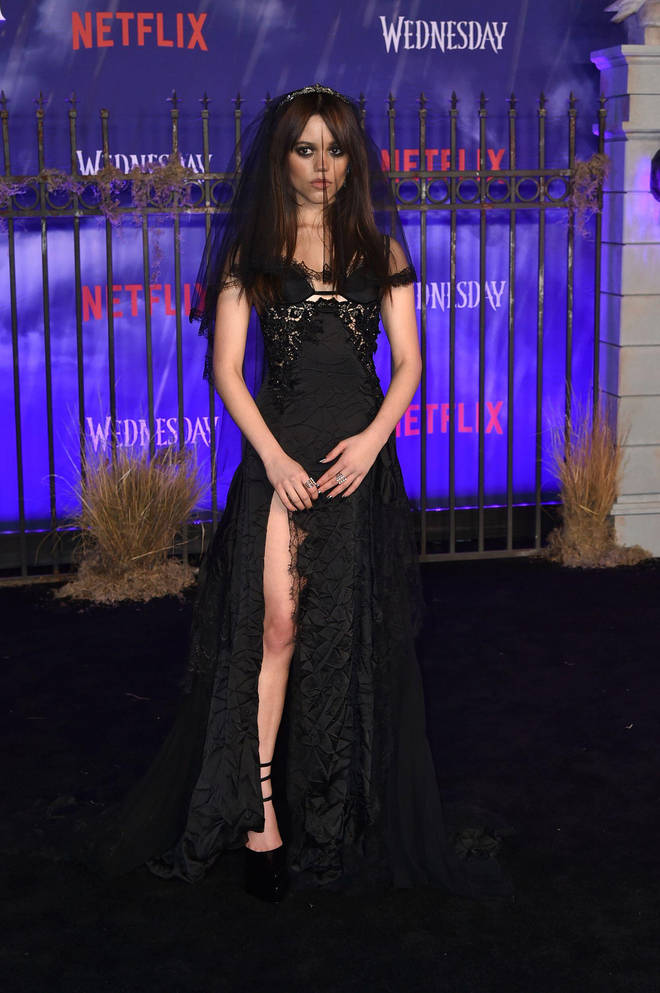 Jenna dressed as a dark Versace bride