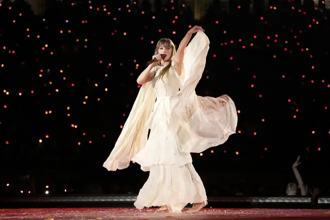 Taylor wears flowy gowns during the folky ear