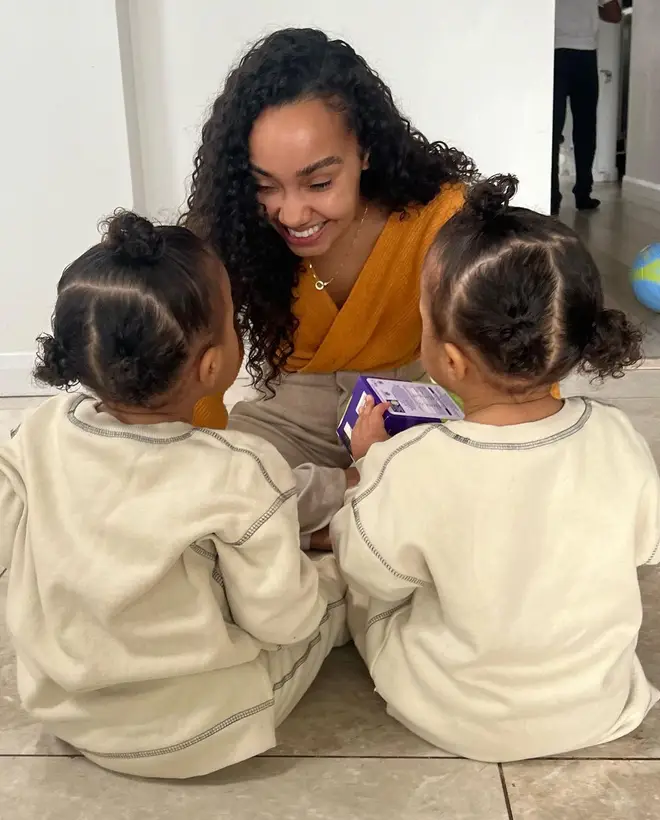 Leigh-Anne beams with her babies
