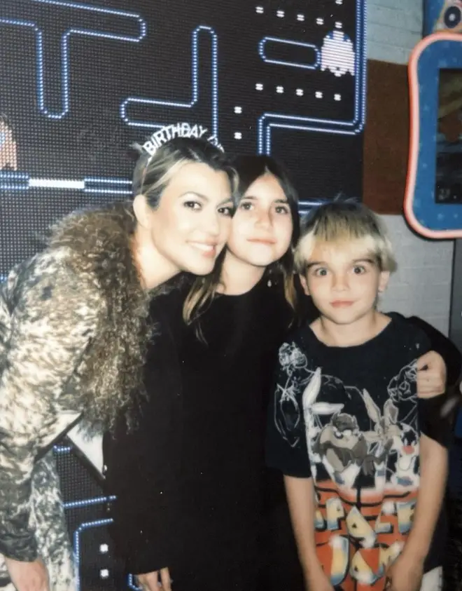 Kourtney Kardashian with kids Penelope and Reign