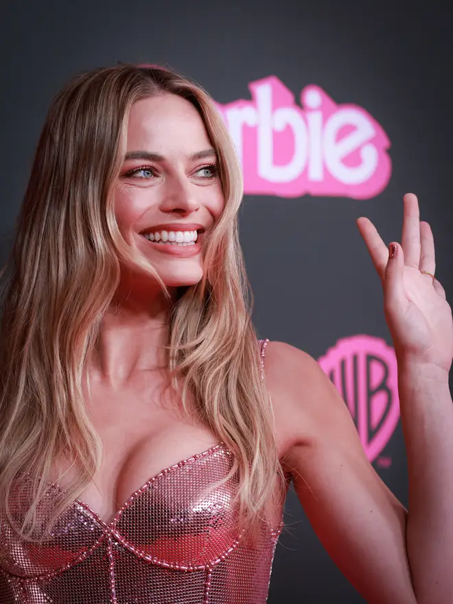 Margot Robbie wore subtly shimmering natural makeup to the Vogue X Barbie event