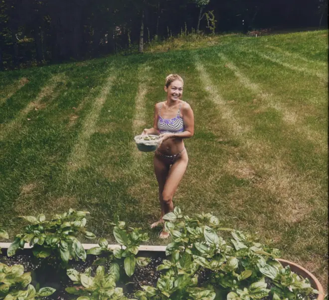 Gigi Hadid included a photo of herself picking vegetables in her garden