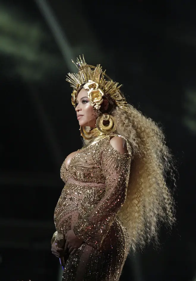 Beyonce performing at the Grammys while she was pregnant with twins Rumi and Sir