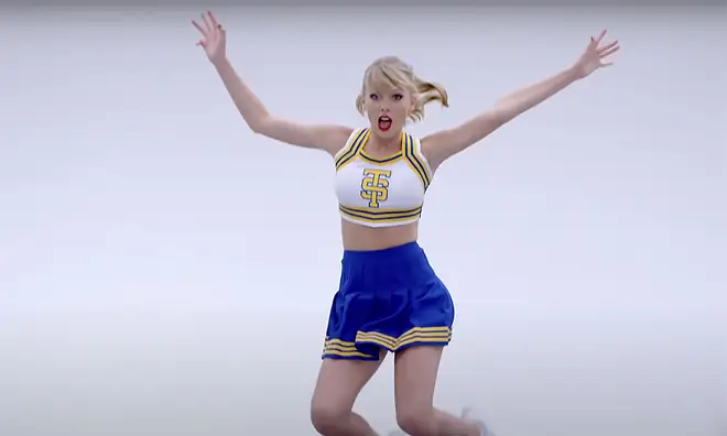 Taylor Swift dressed as a cheerleader from the video to Shake It Off