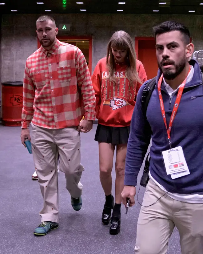 Travis and Taylor leave Arrowhead stadium after an NFL football game