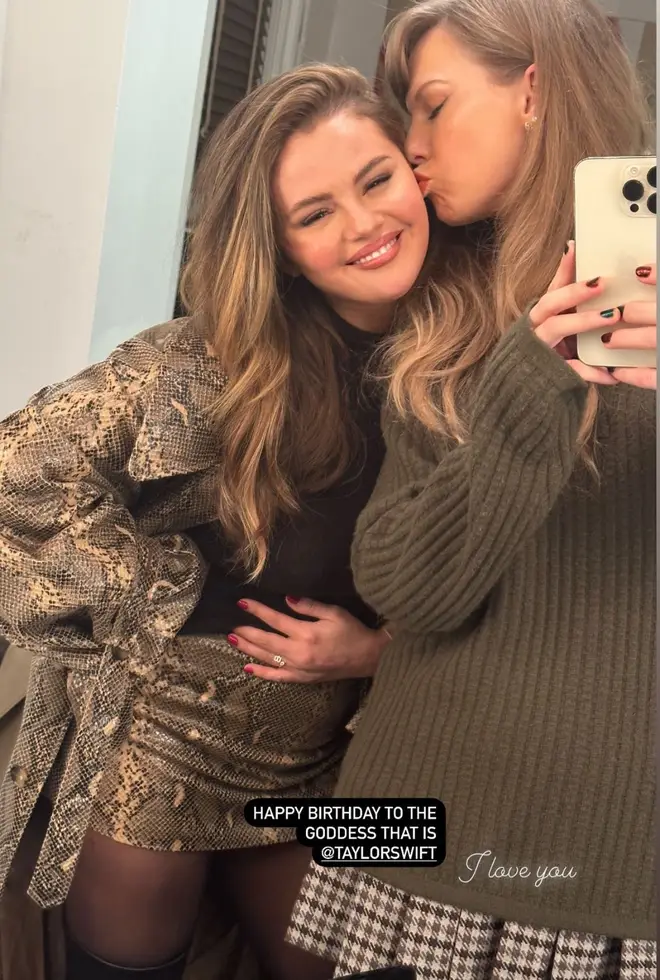 Taylor plants a kiss on Selena's head in the most adorable mirror selfie