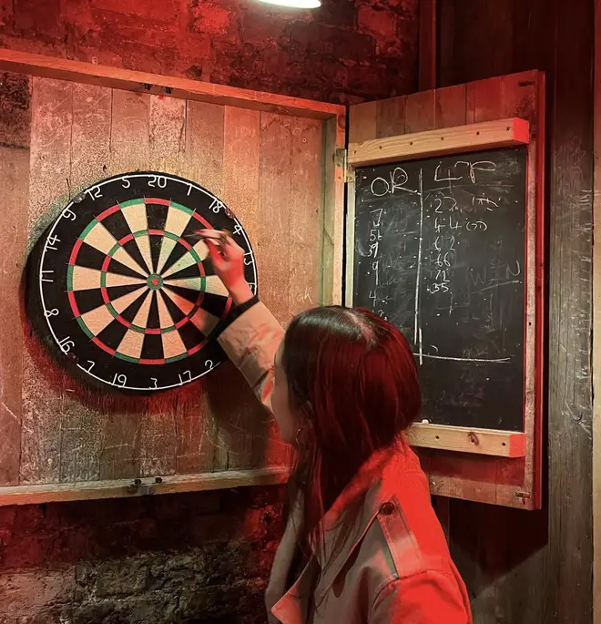 Olivia Rodrigo and Louis Partridge's initials were clear on a picture of a dartboard the pop star uploaded