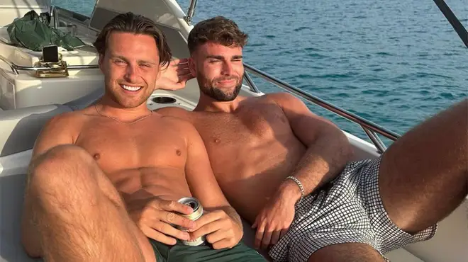 Love Island's Casey O'Gorman and Tom Clare on a boat on holiday