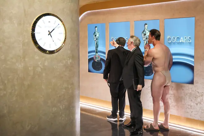 Here's what John Cena was actually wearing behind the envelope during his nude Oscars moment