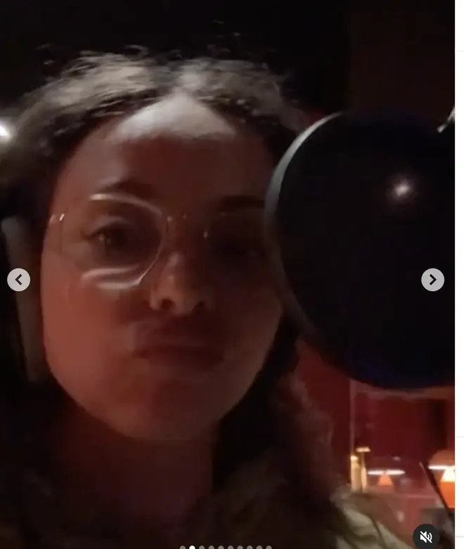 Jade uploaded a video of herself in front of a recording mic