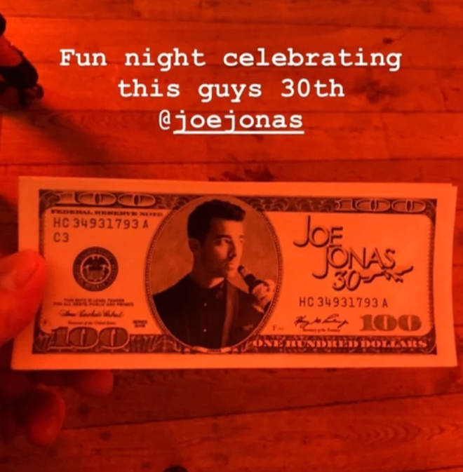 Joe Jonas' custom made dollar bills at his birthday party