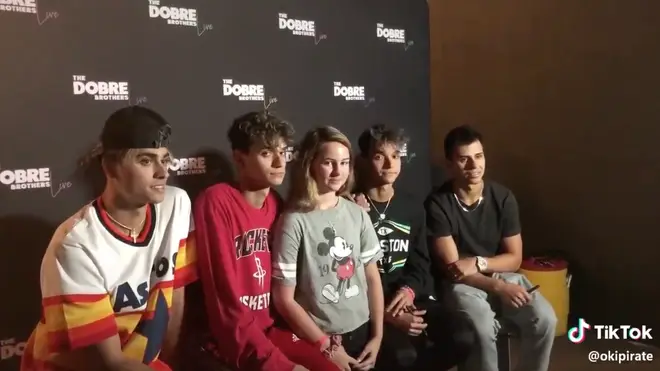 The Dobre brothers appeared bored and didn't talk to the fan who paid for a meet and greet