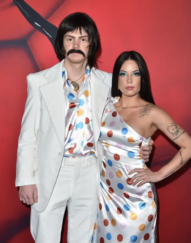Evan Peters and Halsey dressed as Sonny and Cher at American Horror Story 100th episode party