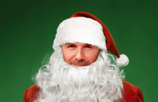 Tell us the name of the celebrity hiding under the Santa costume