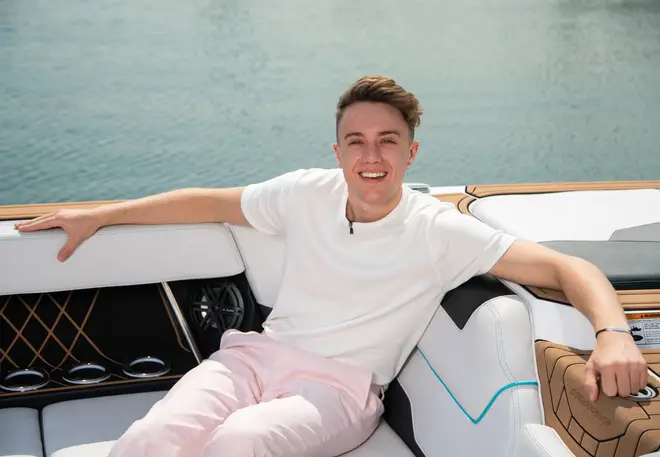 Roman Kemp arrived on the beach by speedboat