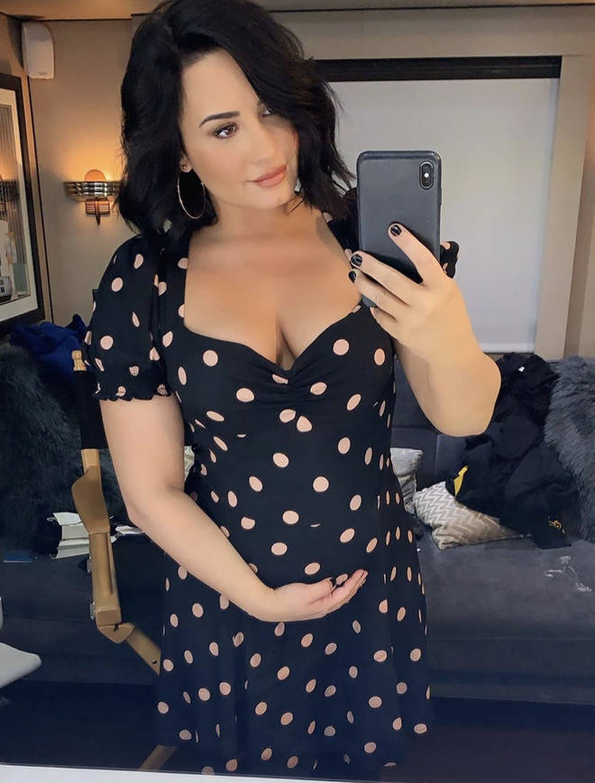 Demi Lovato asked her fans if her bump looked 'real or fake'