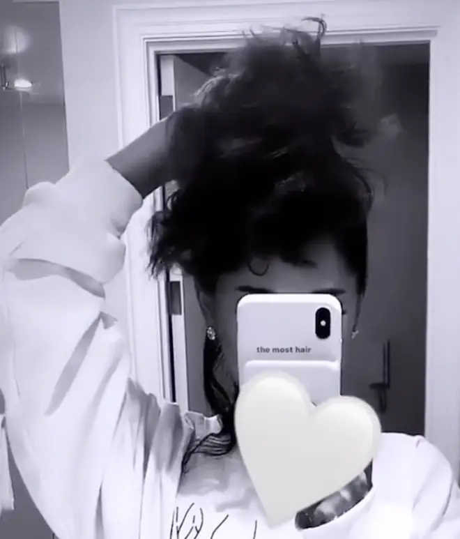 Ariana's hair is super curly.